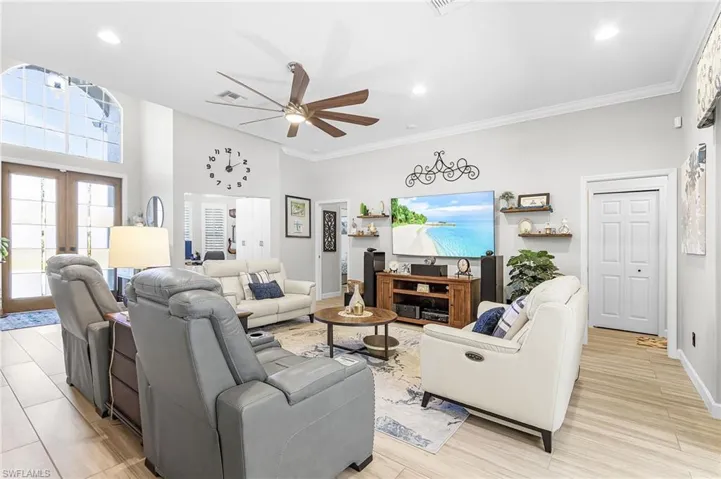 Room offers elegant flooring very roomy space for gathering.