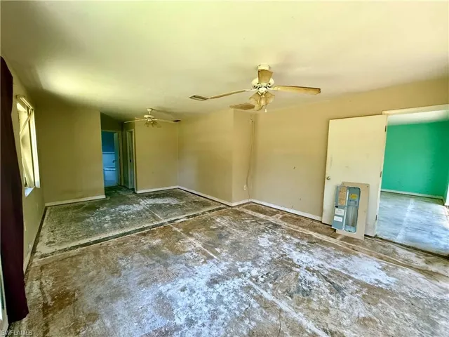 Master Bedroom with baseboards and a ceiling fan
