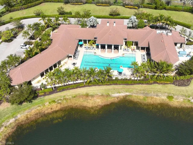 Luxurious resort-style pool with ample lounge space for relaxation.