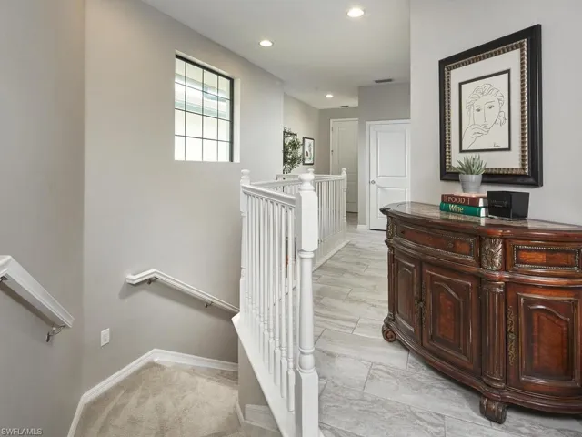 The stairs or the elevator?  There is an elevator to the rear of the foyer, which can easily accommodate people, luggage, groceries and your favorite beverage!