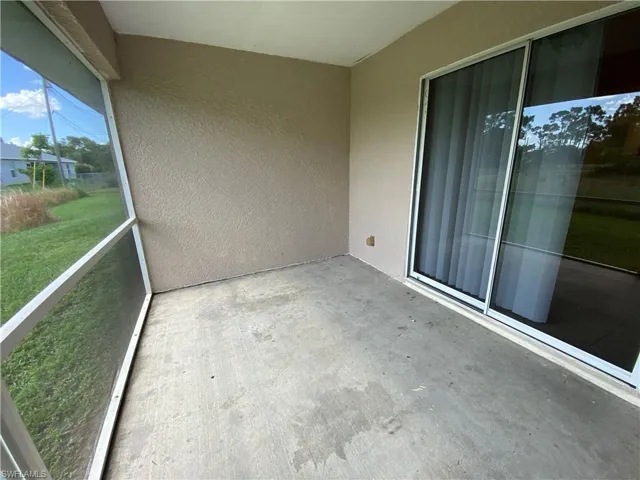 Screened in lanai that can be accessed through living room, master bedroom and rear lanai screened door.