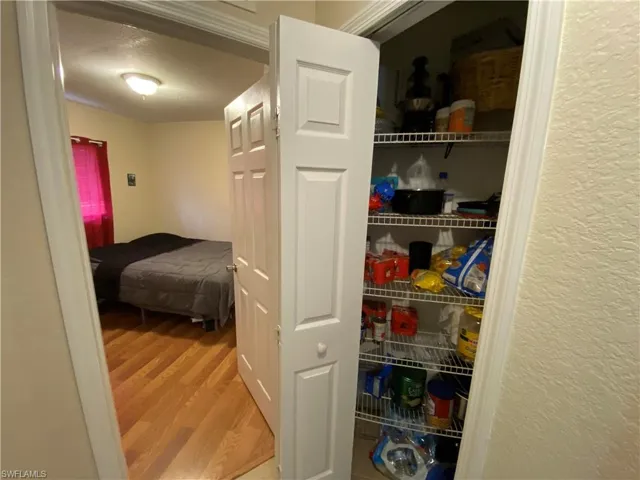 View of closet in hallway. Tenants use it as a pantry.