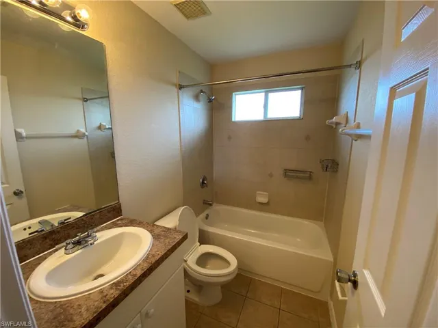 Guest Bathroom with tub and shower.