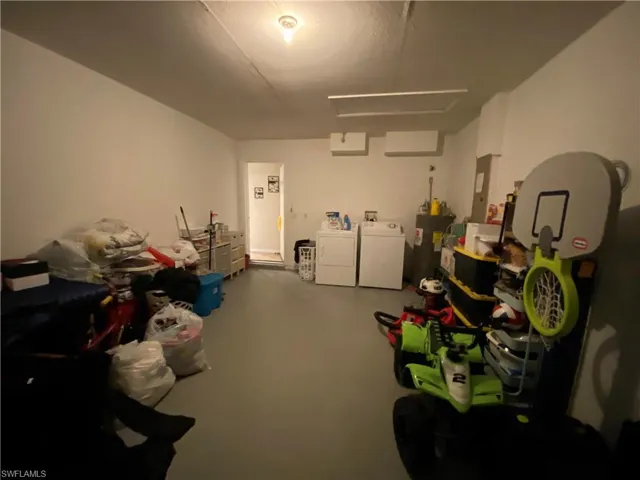 Laundry hookup in garage as well as water heater.