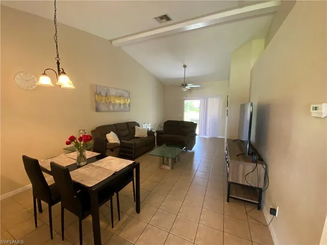 Living room/dining area in tenant occupied side.