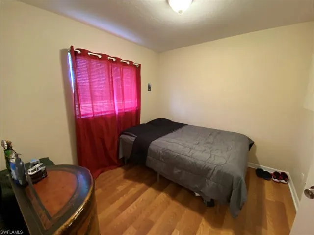 Bedroom #2 includes wooden floors.