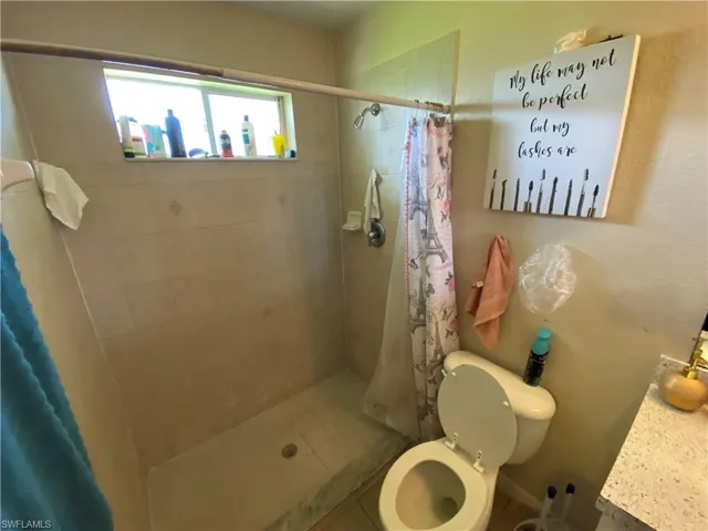 Master bathroom includes a standing shower.