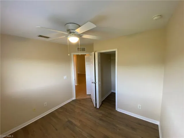 Bedroom #1 showing walk in closet.