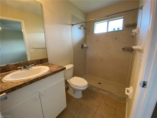 Master bathroom with standing shower.