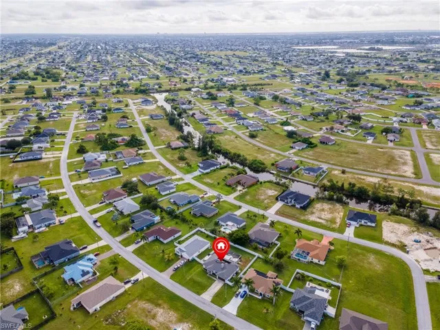 View of property location featuring nearby suburban area