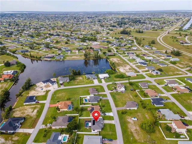 Aerial view of residential area with a nearby body of water