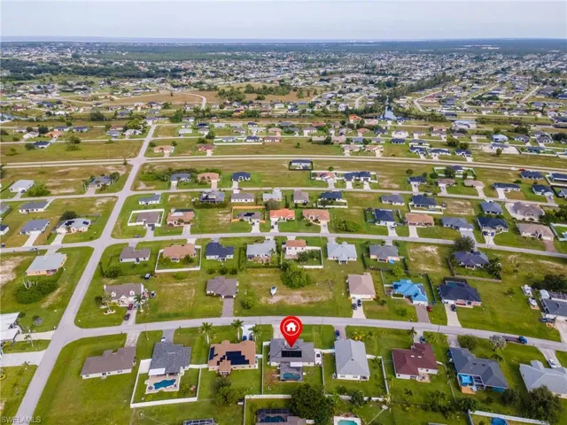 View of property location featuring nearby suburban area
