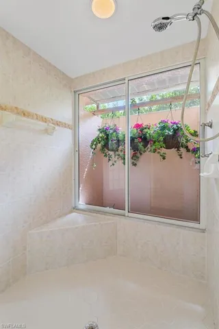 Bathroom with tiled shower