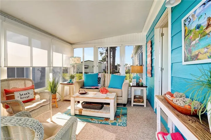 Sunroom / solarium with an outdoor living space