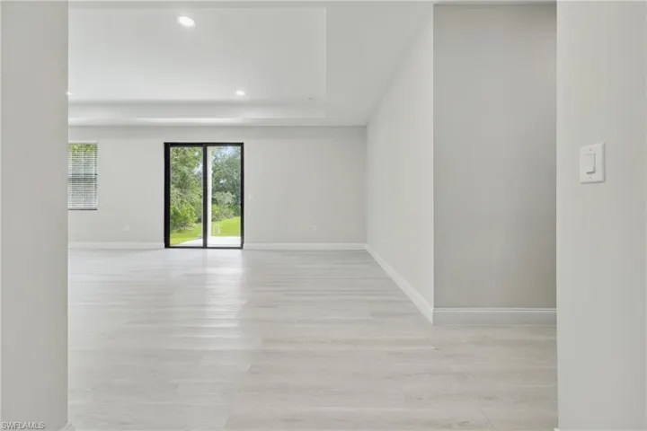 Unfurnished room featuring recessed lighting