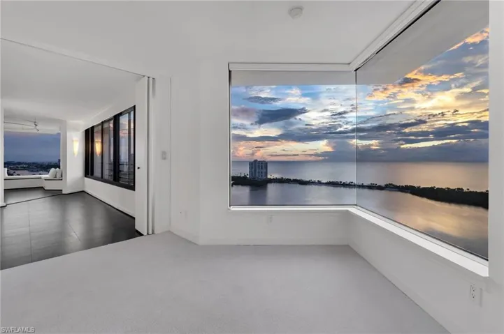 Primary Suite Sitting Area by Night Unstaged