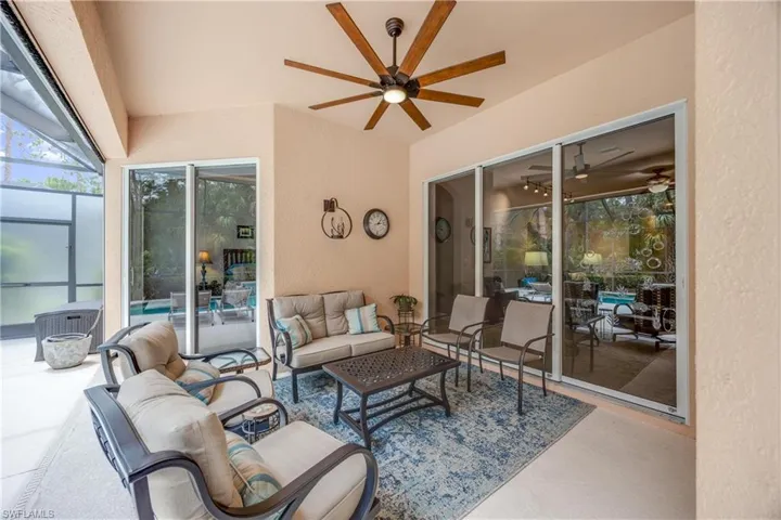 Sunroom featuring ceiling fan