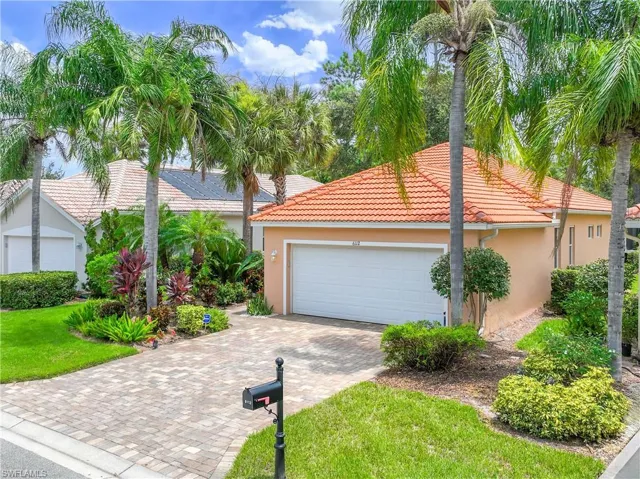View of front of property with a garage