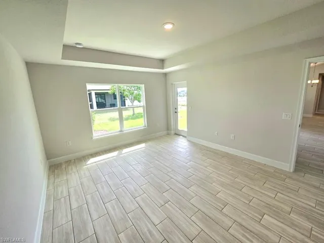 Empty room with light wood-type flooring