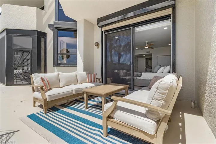 View of patio with an outdoor living space