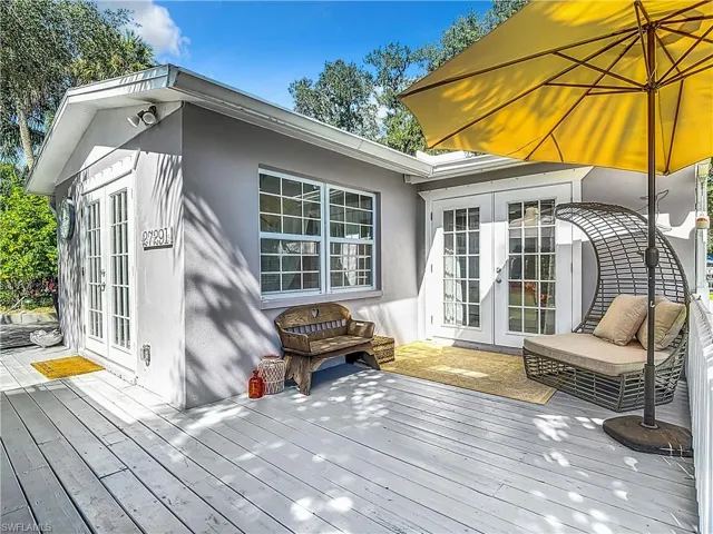 Wooden terrace with french doors