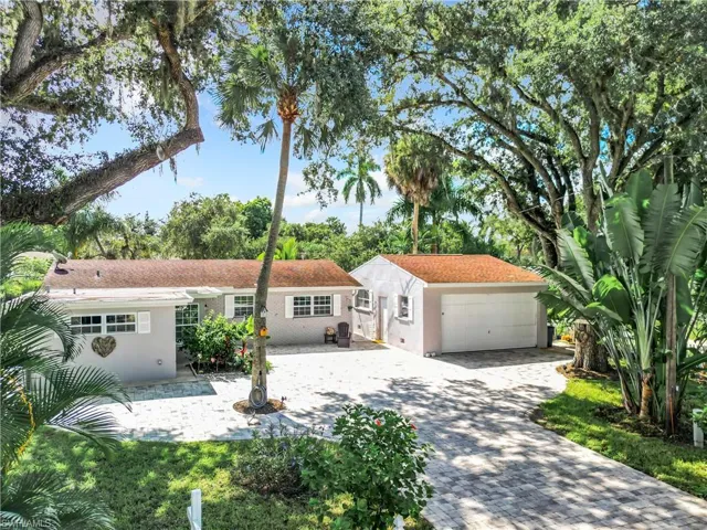 Riverfront home with a double car garage 2 doors/one in front and back