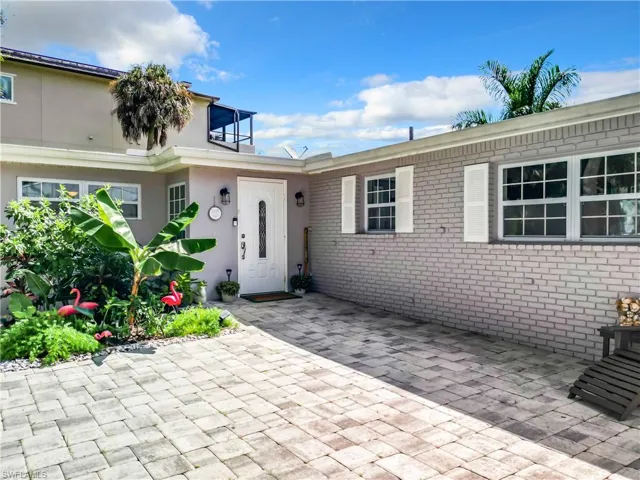 View of exterior entry and interlocking pavers