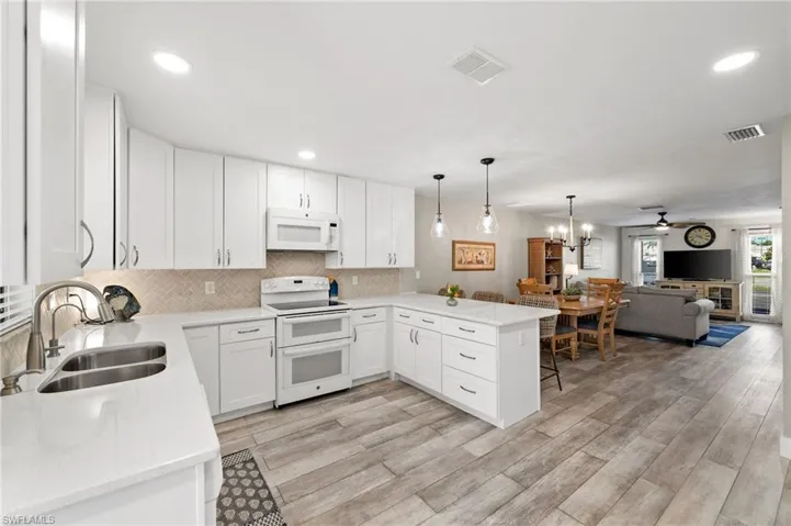 Beautifully Updated Kitchen with quartz counters.