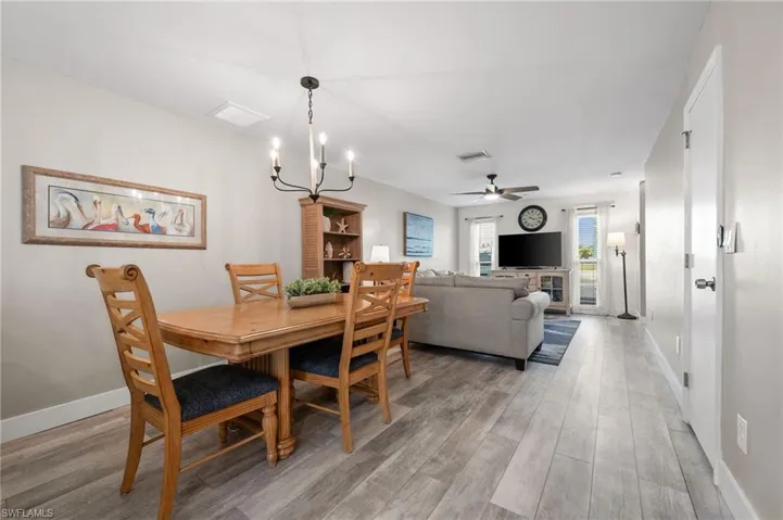 Dining and Living Room. Lots of  room for family and friends to gather.