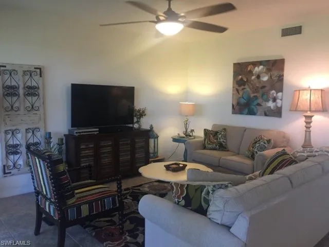 Living area with a ceiling fan