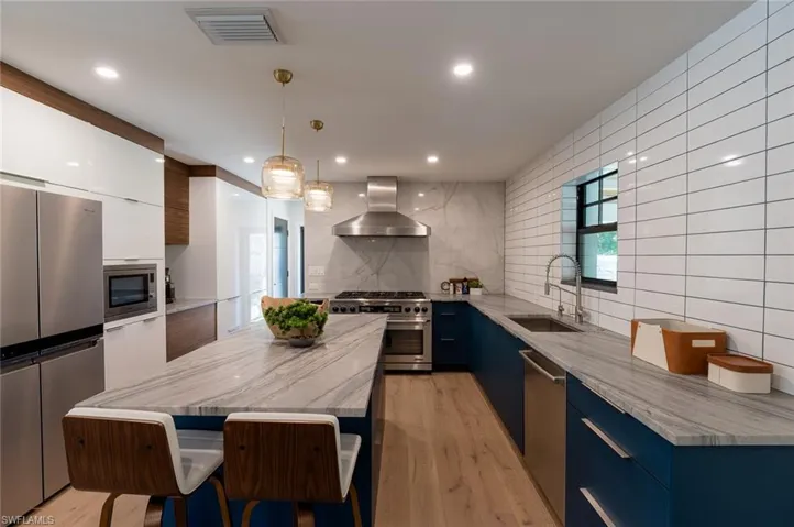 Custom cabinets with center island, granite tops