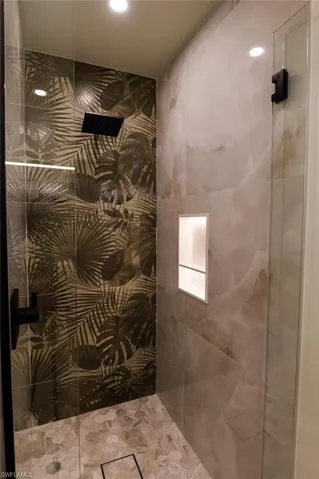 Walk in shower with lighted niche