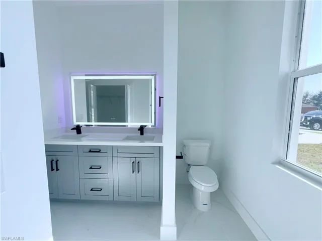 Dual sinks and toilet