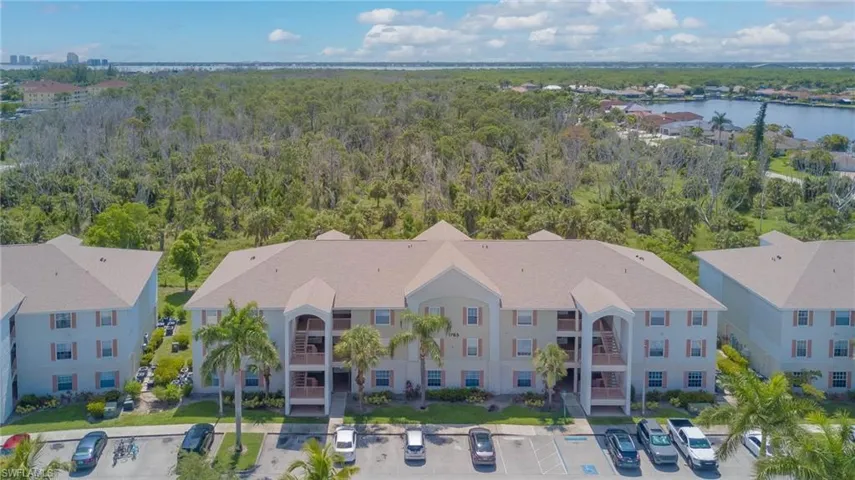 Bird's eye view of a large body of water and a heavily wooded area