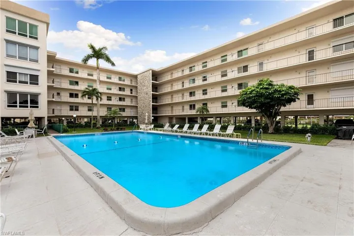 Barbecue area near pool, social room on second floor