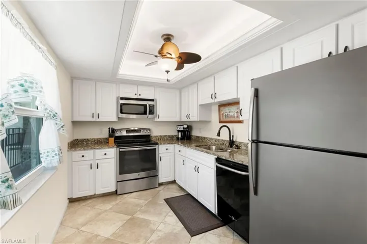 Impact windows throughout including large window in kitchen