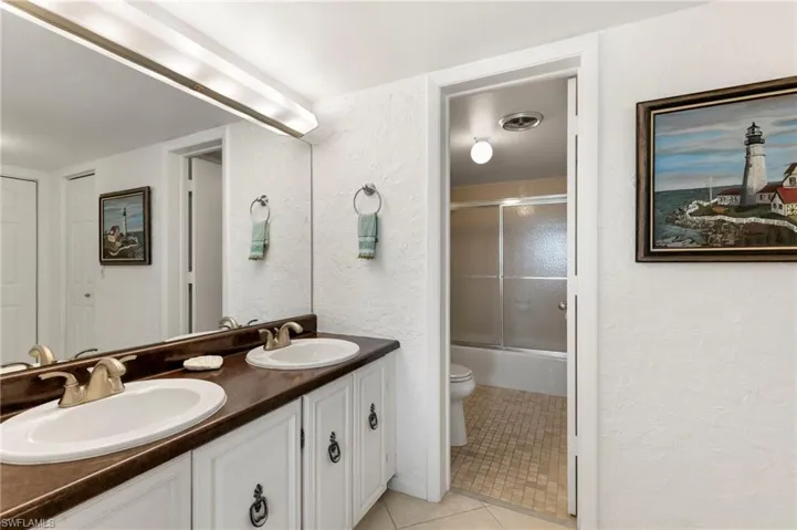 Double sinks separate from shower
