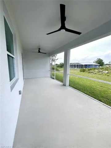 View of terrace featuring ceiling fan