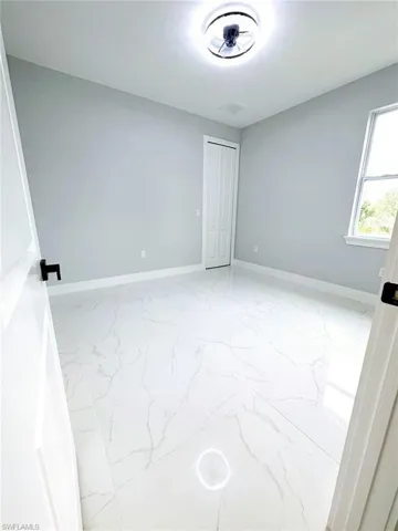 View of tiled spare room