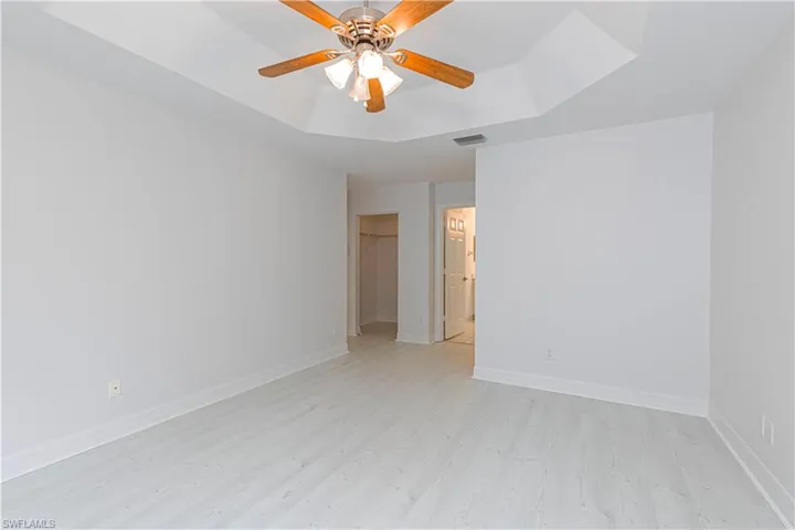 Master bedroom with a coffered ceiling