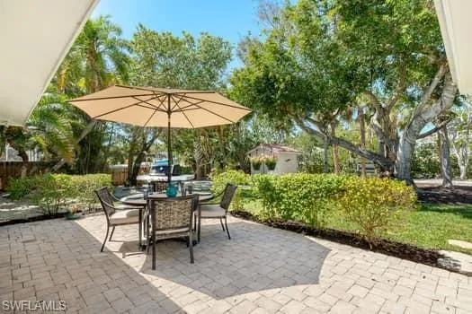 View of patio with outdoor dining space