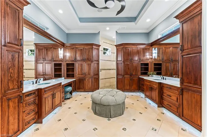 Master Bathroom, his and hers vanities ,walk in shower, ample cabinet space, additional laundry room