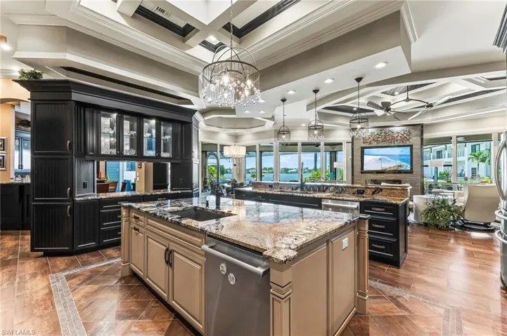 Kitchen with an island with additional sink