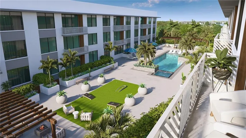 View of property's community featuring a swimming pool and a patio area