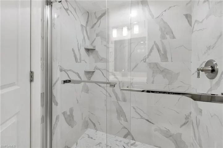NEW marble shower with built-in shelves