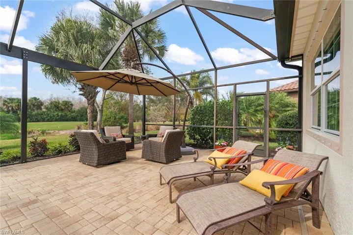 View of patio featuring screened-in lanai with Southwest rear exposure, and outdoor lounge area