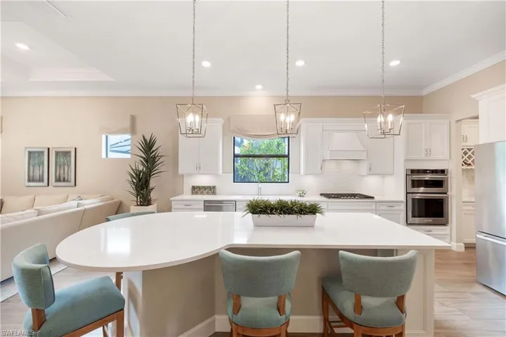 Granite Counters, Bosch Appliances, Extended Island & Custom Lighting