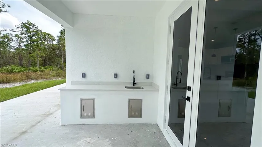 View of patio / terrace with a sink