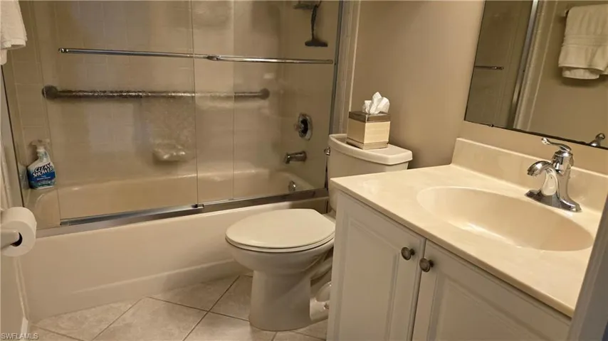 Guest bathroom with tub and shower
