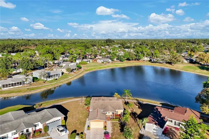 Aerial view of residential area with a large body of water